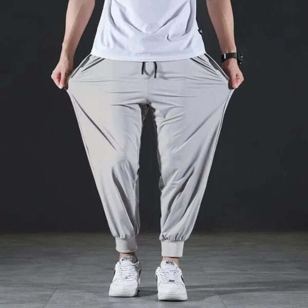 Summer Quick-drying Ice Silk Casual Pants Men's Ultra-thin Elastic Nine-point Pants Loose Drape Solid  Beam Feet Pants 7XL - Image 2